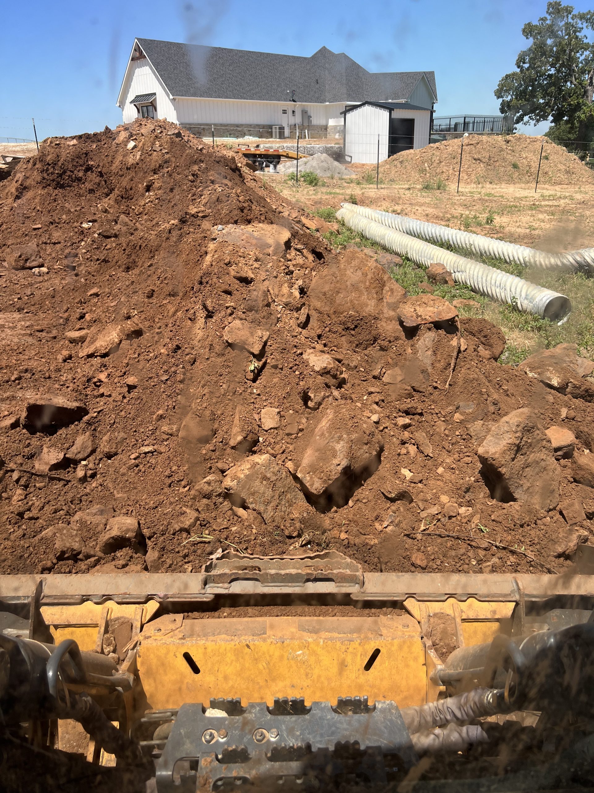 Property graded to improve drainage and control runoff