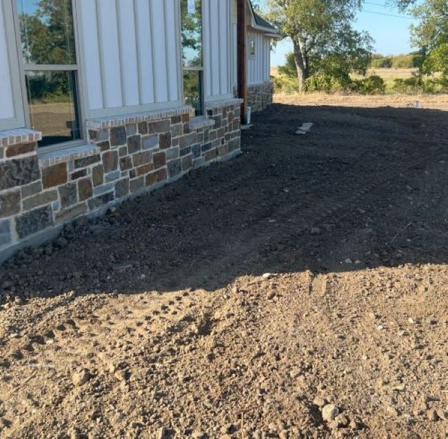 Residential home site with freshly prepared foundation pad